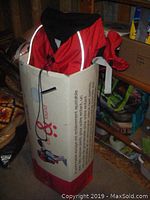 Phil & Teds Escape Carrier child backpack in its original box, showing branding and product information