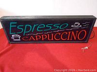 Front of the black rectangular light sign with 