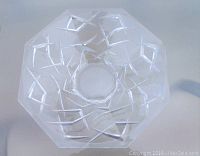 Top view of octagonal Waterford crystal bowl showing geometric cut pattern with diamond shapes and the small chip.