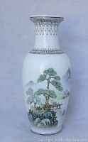 Full view of the vase showing the hand-painted landscape with mountains, pine trees, and pavilion