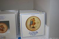 Photo showing M.J. Hummel plate in original box marked 1980 edition.