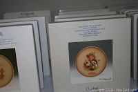 Photo of boxed 1986 Hummel Annual Decorative Plate showing front of box with plate artwork and year.