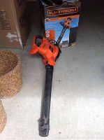 Black & Decker blower vacuum with cord and box in background