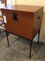 Side view showing shape, color, latch, and missing hanging file rails details.