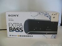 Photo of Sony SRS-XB21 Extra Bass Bluetooth Speaker box showing front side with product name and image.