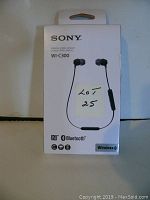 Front of Sony WI-C300 Bluetooth wireless stereo headset retail box showing product image and model details.