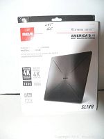 Front view of the RCA SLIVR indoor flat amplified HDTV antenna box showing the product image and key features such as 4K Ultra HD reception and multidirectional.