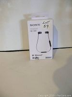 Front view of Sony WI-C300 Bluetooth headset box showing product image and branding.