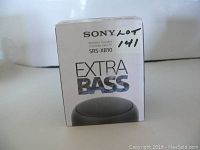 Front of box showing Sony SRS-XB10 wireless speaker with Extra Bass branding.