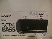 Photo of Sony SRS-XB21 Extra Bass speaker box showing product branding and model