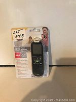 Front of RCA digital voice recorder in sealed original packaging showing product, 2GB memory, and 800 hours recording time.