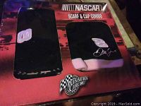 NASCAR scarf and cap combo showing black scarf with number '00' and matching black beanie cap with number '3' and Dale Earnhardt signature embroidery, displayed in original packaging with a Winners Circle NASCAR emblem.