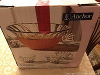 Box front showing Anchor Hocking Victoria punch bowl filled with beverage, punch cups and server in front of box image.