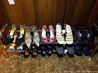 Overview photo showing all 10 pairs of women's high heel shoes arranged on a rack. Varied styles and colors visible.