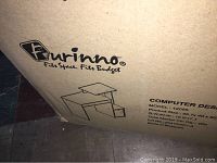 Photo of Furinno computer desk box with brand and model details visible.
