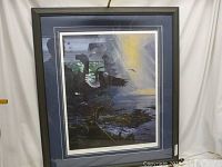 Full view of the framed print showing the artwork, matting, and frame.