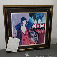Framed seriolithograph with paperwork shown at the front, full view of the artwork and frame.