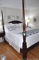 Front view of assembled king bed with bedding