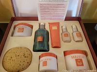 Top view of Borghese spa kit with face and body treatment items.