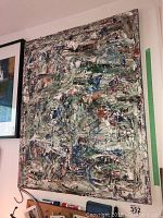 Frontal view of unframed abstract painting showing full artwork filled with thick textured brushstrokes in multiple colors such as white, green, blue, red, black.