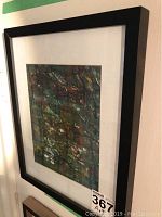 Framed abstract artwork by Alex Hare shown from the front, displaying size and frame details.