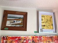 Two framed artworks hanging on a wall; one depicting a boat and the other an abstract piece.