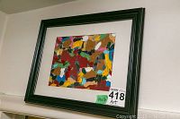 Framed abstract artwork by Alex Hare showing full view with the 14x17 inch measurement label and auction lot number.