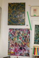 Two unframed abstract art paintings on a wall, largest artwork measuring approximately 22x28 inches