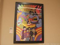 Full view of the framed 3D wall art featuring The Beatles Yellow Submarine characters and iconic imagery.