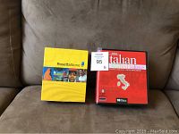 Rosetta Stone and Instant Immersion Italian language instruction sets with a lot tag number 95.