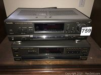 Front view of two stacked Technics audio components: SA-GX190 stereo receiver on top and an audio device below.