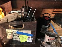 Fabric box holding various router templates.