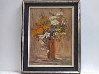 Full view of oil painting in frame showing floral bouquet in vase.