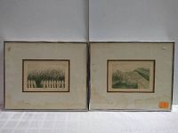 Two framed prints with visible water damage stains on mats and borders, images otherwise intact