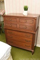 Full view of Gibbard chest on chest dresser showing wood finish and drawer handles