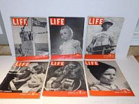Six vintage LIFE magazines arranged in two rows with clear view of covers showing various black and white photographs and LIFE logos.