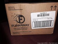 Closed cardboard shipping case labeled Funk Away odor eliminating spray for clothes and gear, containing 12 bottles each 3.4 fluid ounces.