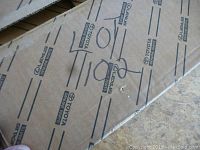 Photo showing cardboard boxes labeled with 'Toyota Genuine Parts' containing the packed LPs.