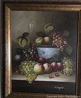 Front view of the framed still life acrylic painting showing the entire artwork, composition, and signature.