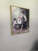 Framed Norman Rockwell poster print hanging on wall, showing full artwork and frame