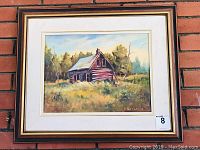 Framed original oil painting of a log cabin landscape by N. Alexander, including artist signature and lot number sticker.