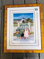 Framed print showing the entire piece with walnut veneer frame, triple matting, and artwork with women in front of gate and distant landscape.