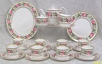 Full set on display showing cups, saucers, plates and accessories.