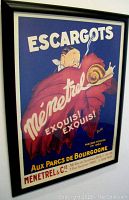 Front view of framed Art Deco advertising poster 'ESCARGOTS Mémetrel' with vibrant colors and clear text.