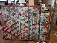 Front view of the original abstract modern art oil painting framed in wood.