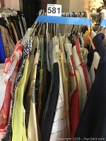 Hanging golf shirts, dresses and jackets on a rack