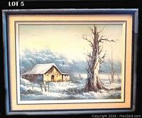 Framed original oil painting of a winter landscape with a barn and trees in snow.