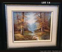 Frontal photo of the entire framed painting showing wooded fall landscape with river and mountains. Framed 16 by 15 inches approx.