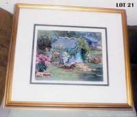 Full view of framed artwork showing the garden scene with tool shed and floral surroundings in a gold-tone wooden frame.