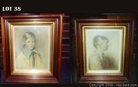 Both child portraits in wood frames with gold insets on a brick background.